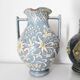 Two small blue ceramic vases