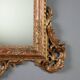 Antique carved and gilded wooden mirror, Italy, early 20th century.
