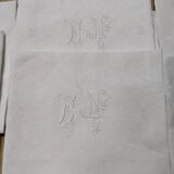 White linen towels embroidered