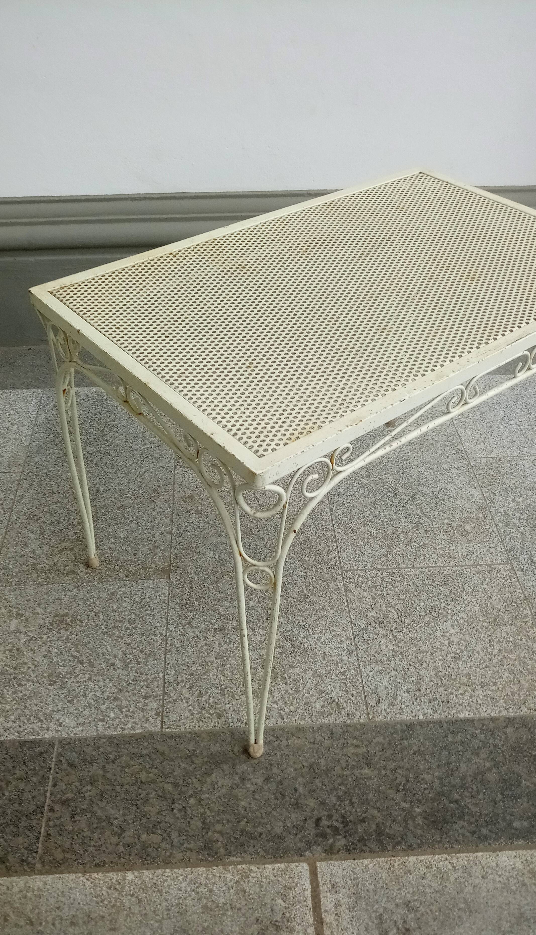 Mid century metal table in the style of mategot