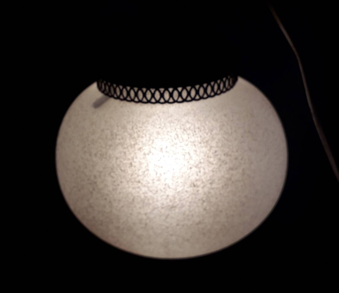 Glass and brass suspension