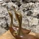 Pair of duck or swan in wood and brass sculpture