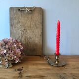 Old copper hand-held candlestick