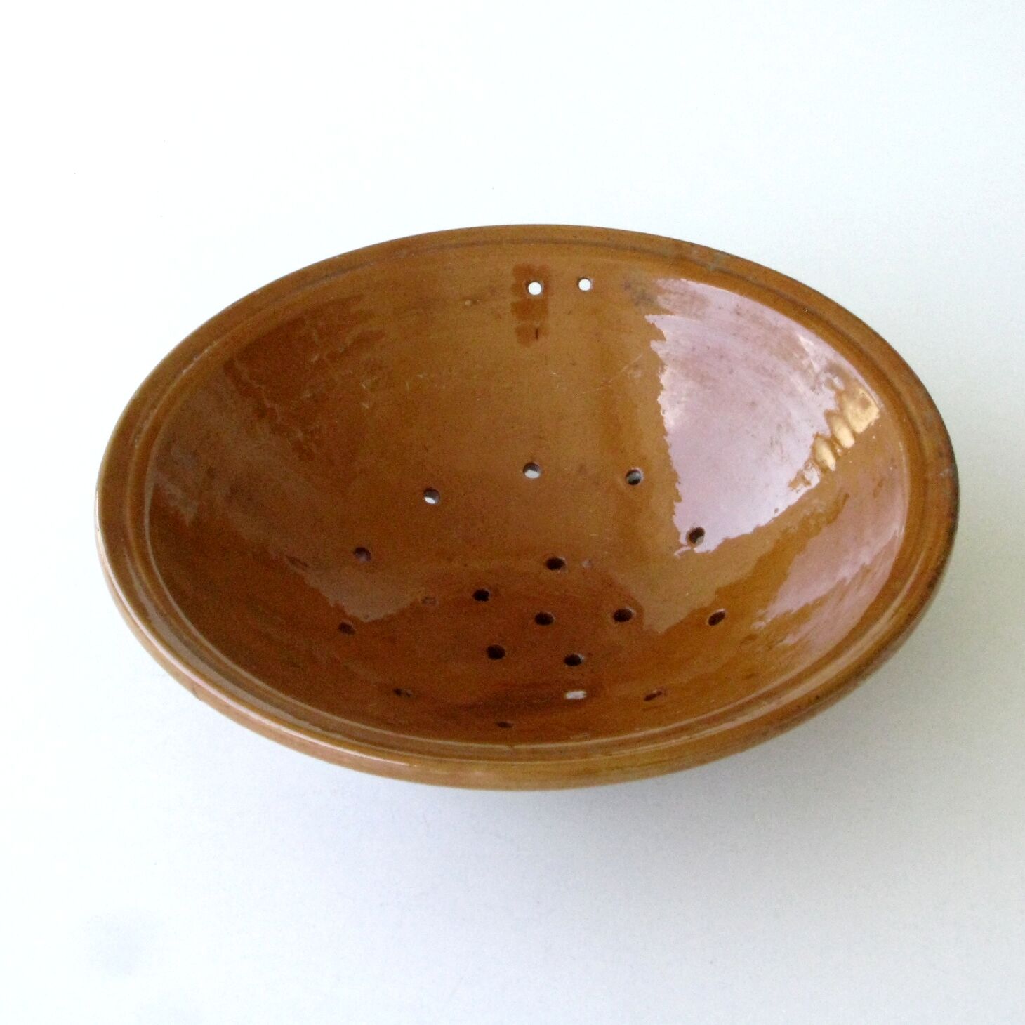 Old drainer dish faisselle in earthenware Varnishing brown
