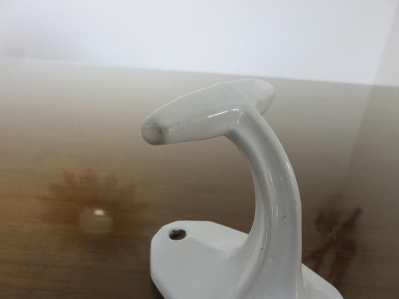 Pair of white cast iron patères art deco 30 40
