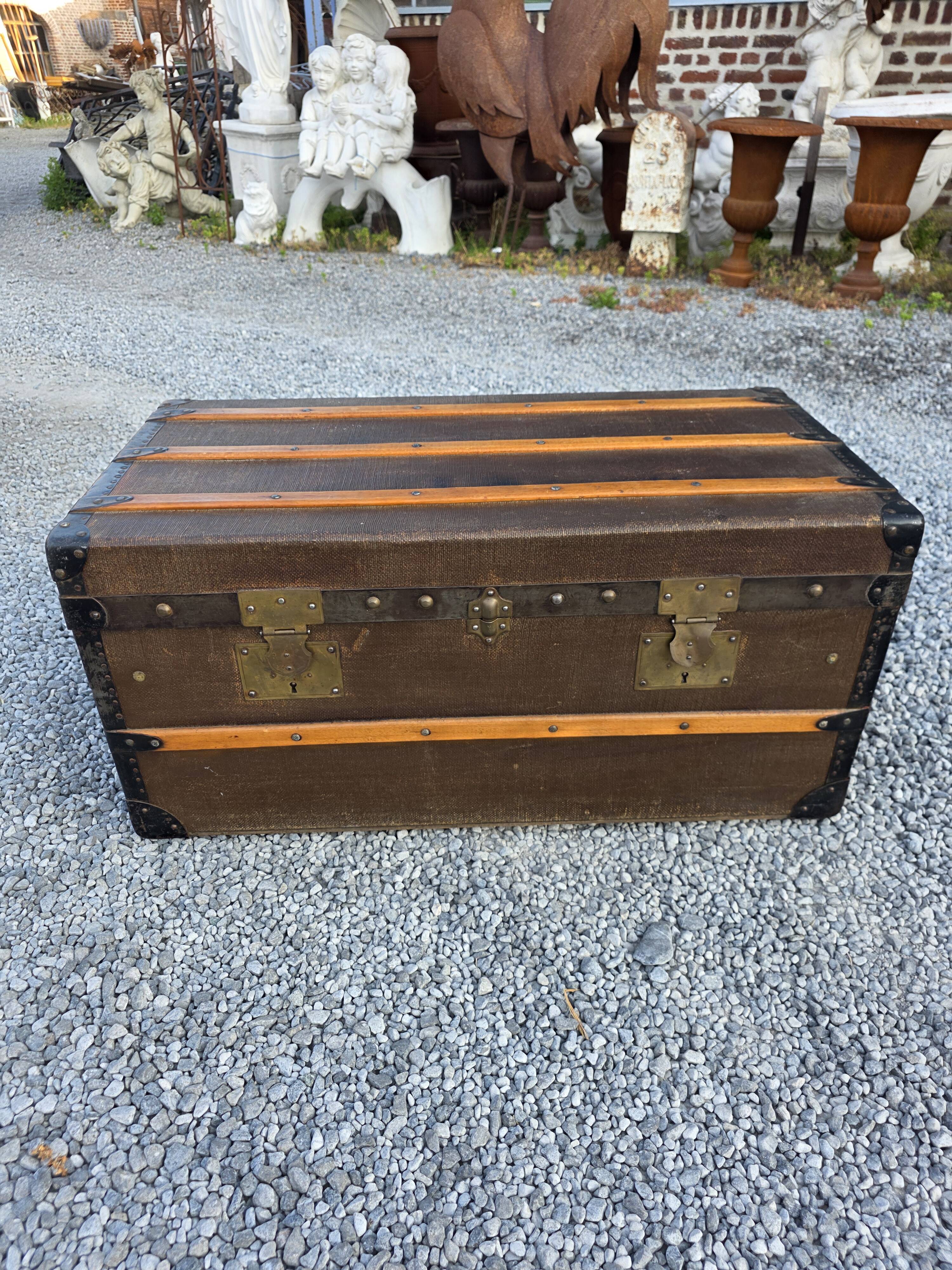 Old travel trunk in oilcloth