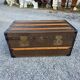 Old travel trunk in oilcloth