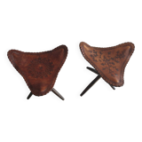 Pair of folding leather tripod stools from the 1950s