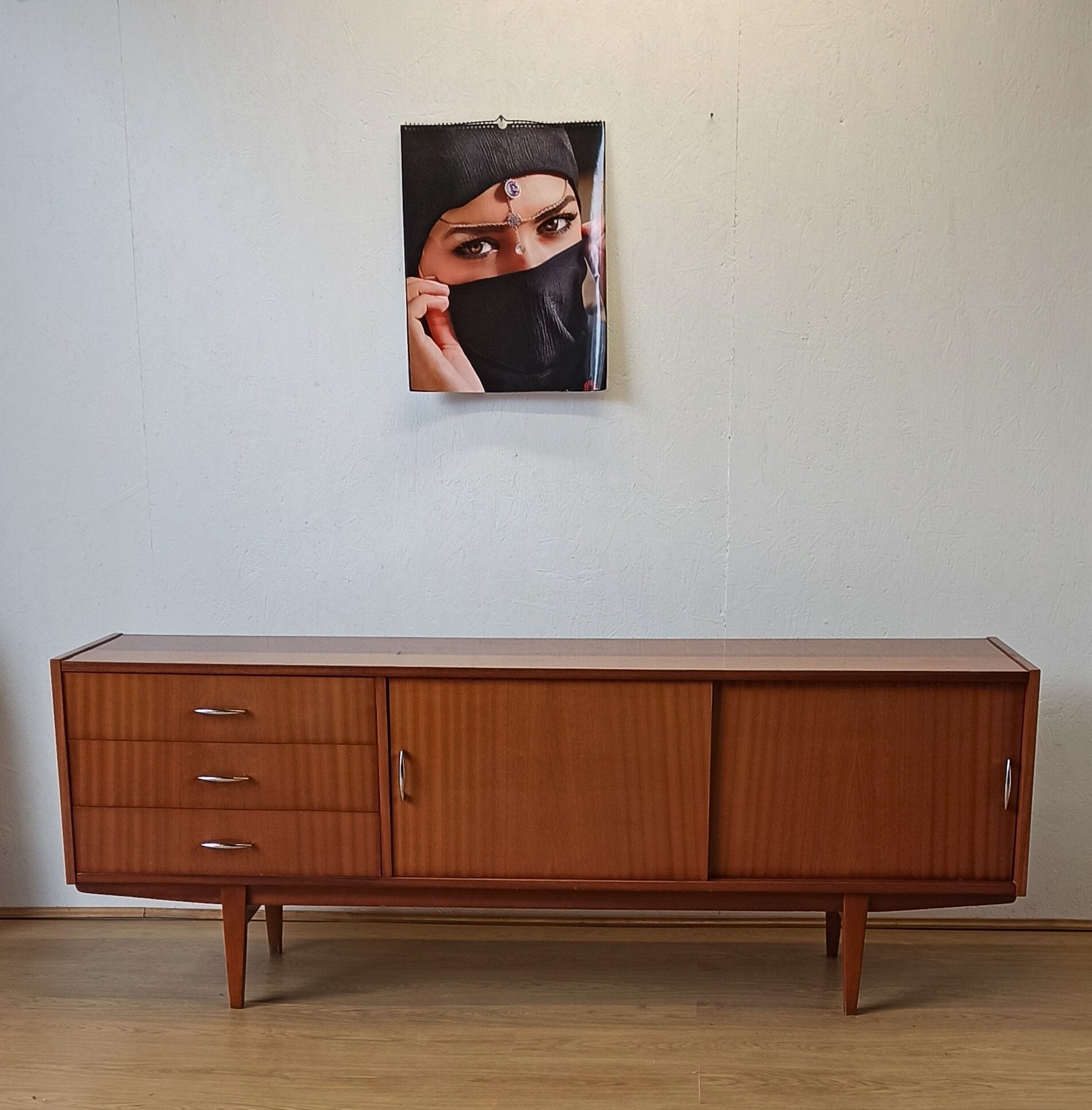 Modernist long sideboard of the 1970s.