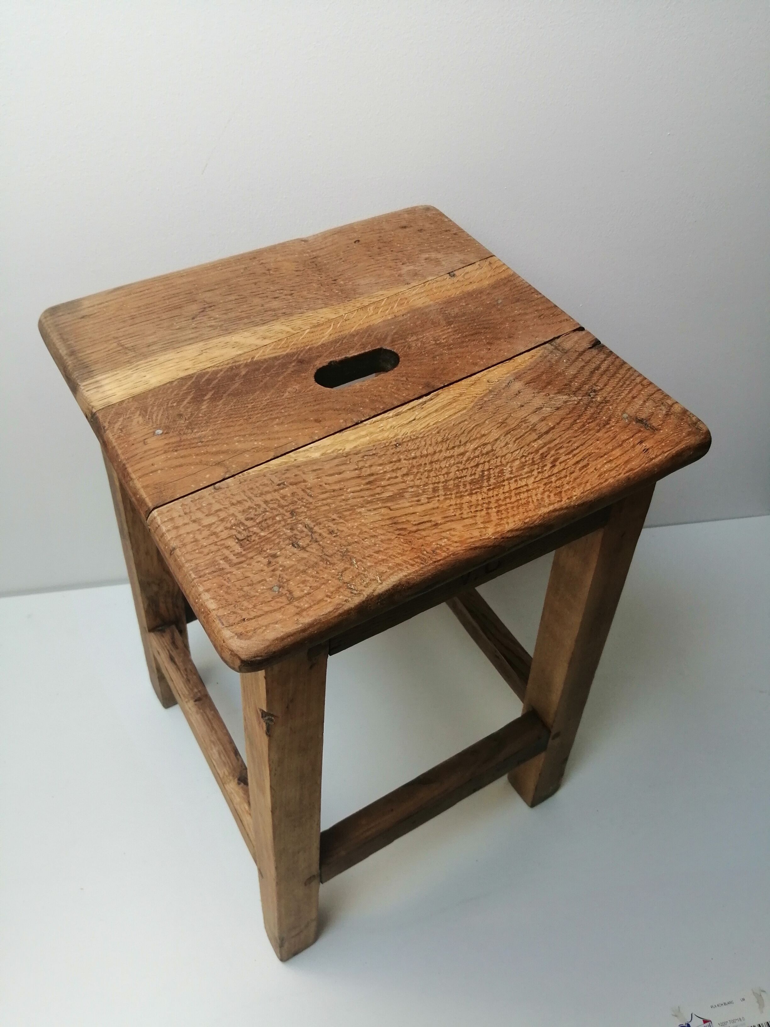 Old farm or workshop stool in oak