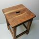Old farm or workshop stool in oak