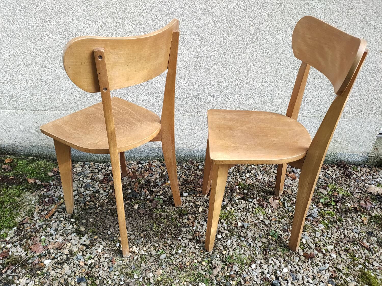 Pair of vintage solid wood bistro chairs