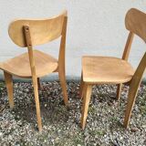 Pair of vintage solid wood bistro chairs