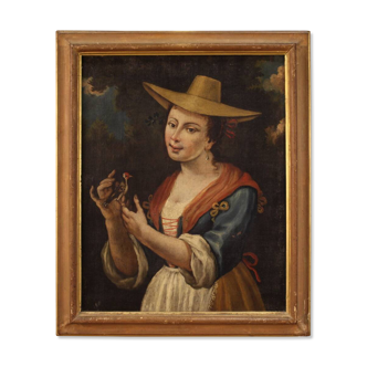 Italian framework portrait of a girl with a goldfinch from 18th century