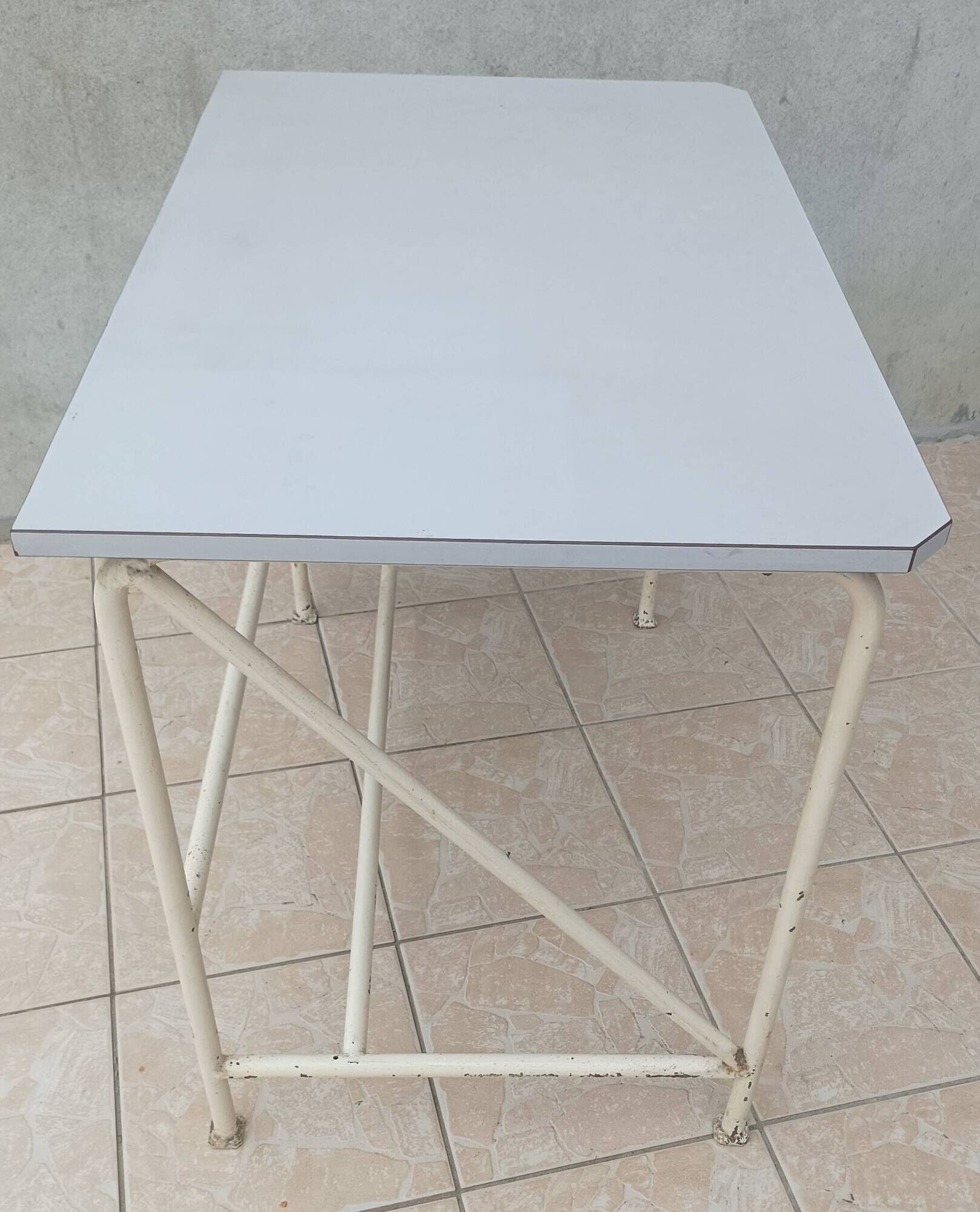 Industrial high table made of metal and formica.
