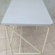 Industrial high table made of metal and formica.