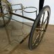 Vintage rolling golden and black dessert in brass and glass