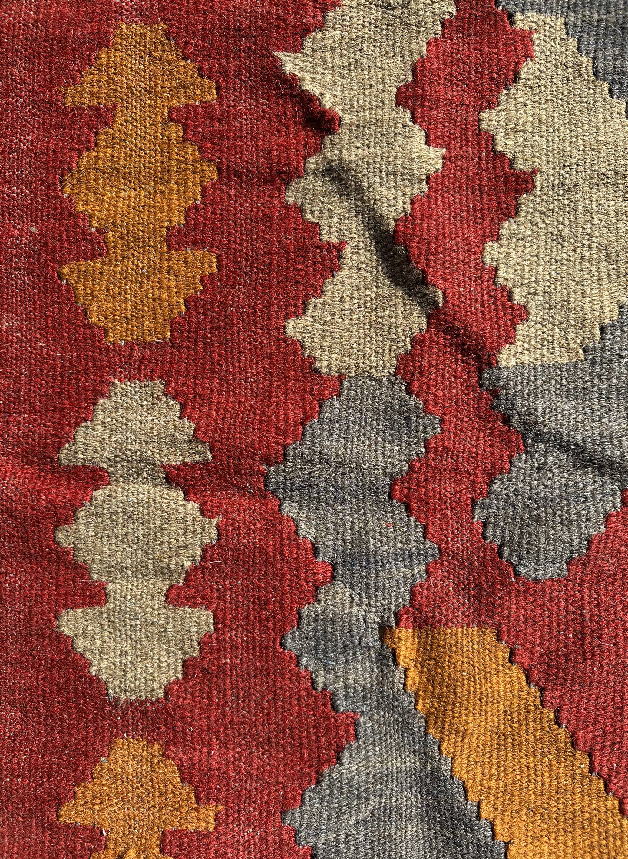 Multicoloured handmade wool kilim rug. Turkey, 1970s.