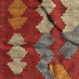 Multicoloured handmade wool kilim rug. Turkey, 1970s.