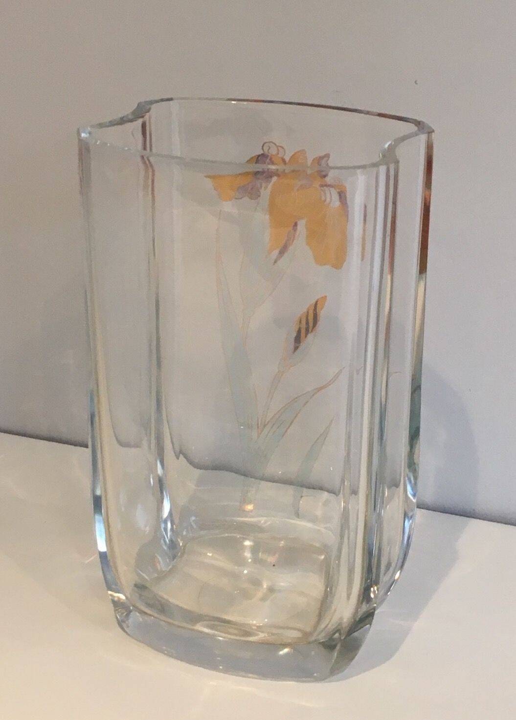 Glass vase with a decoration of a golden flower, around 1970.