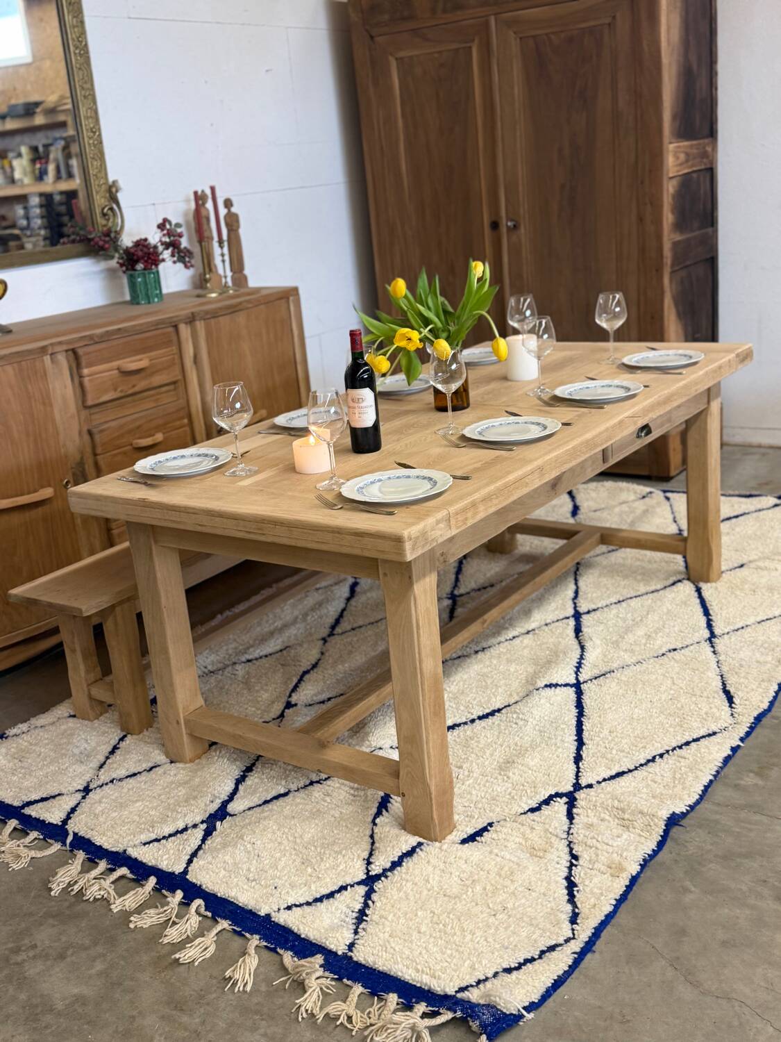 Solid oak extendable farmhouse table with 2 drawers.