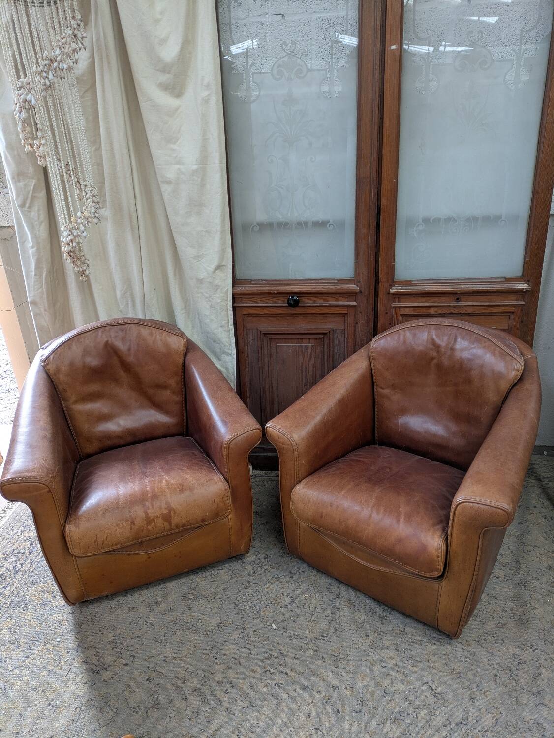 Pair of leather armchairs
