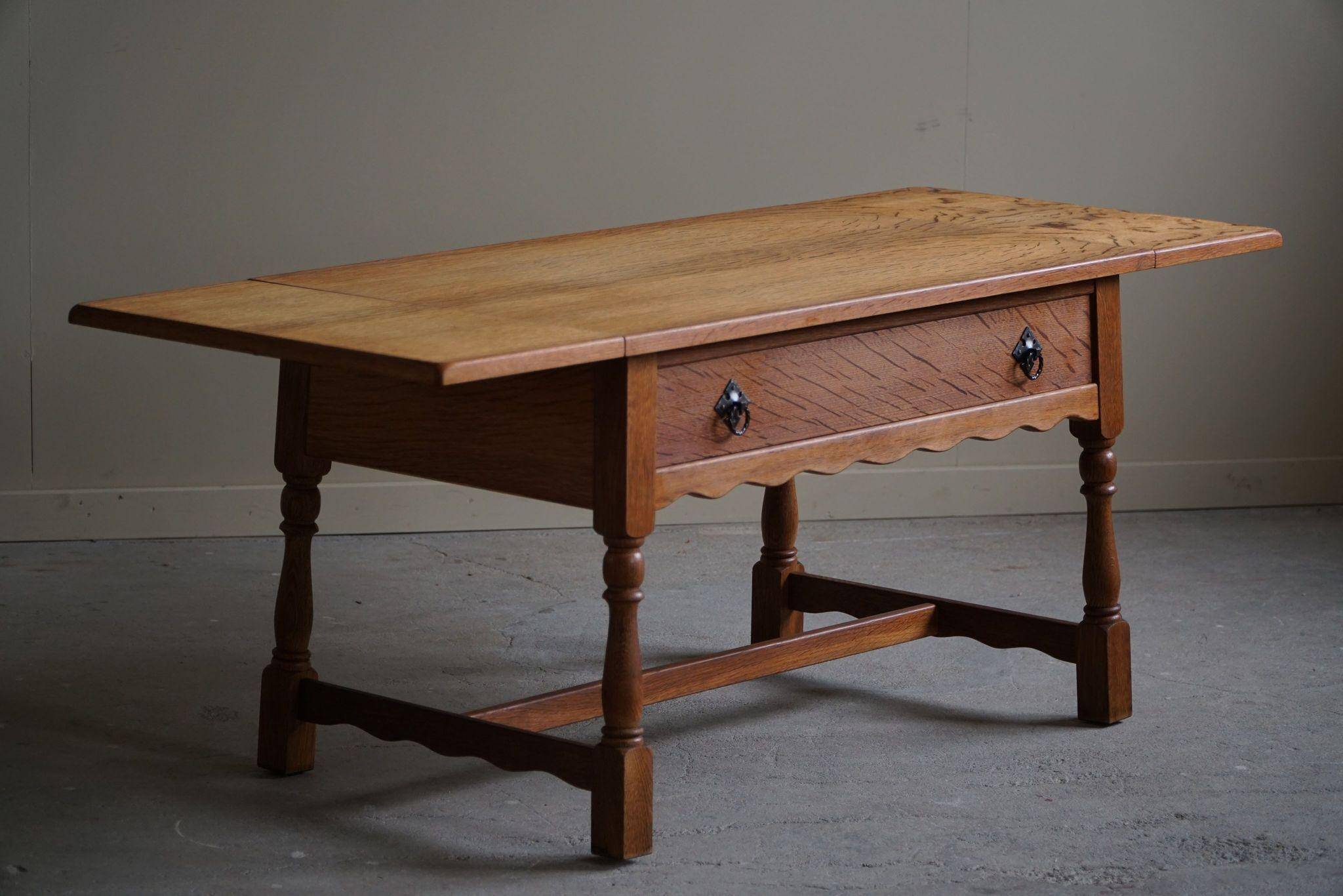 Danish folding table from the mid-century with a drawer in oak, Henning Kjærnulf, 1960s.