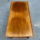 Extendable coffee table in solid wood with two shelves, 100 cm
