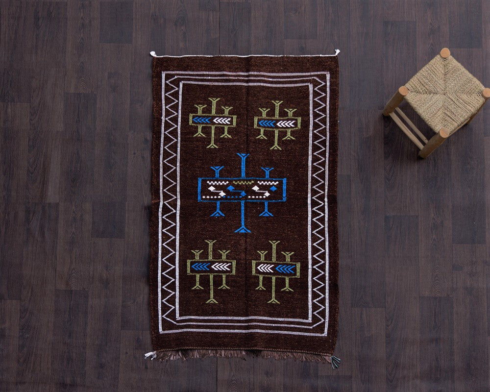 Moroccan ethnic carpet brown