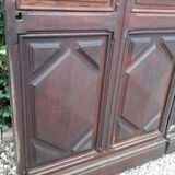 Porte d’entrée vitrée en chêne et grilles en fer, XIXème s.