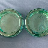Pair of ashtrays or empty round glass pockets