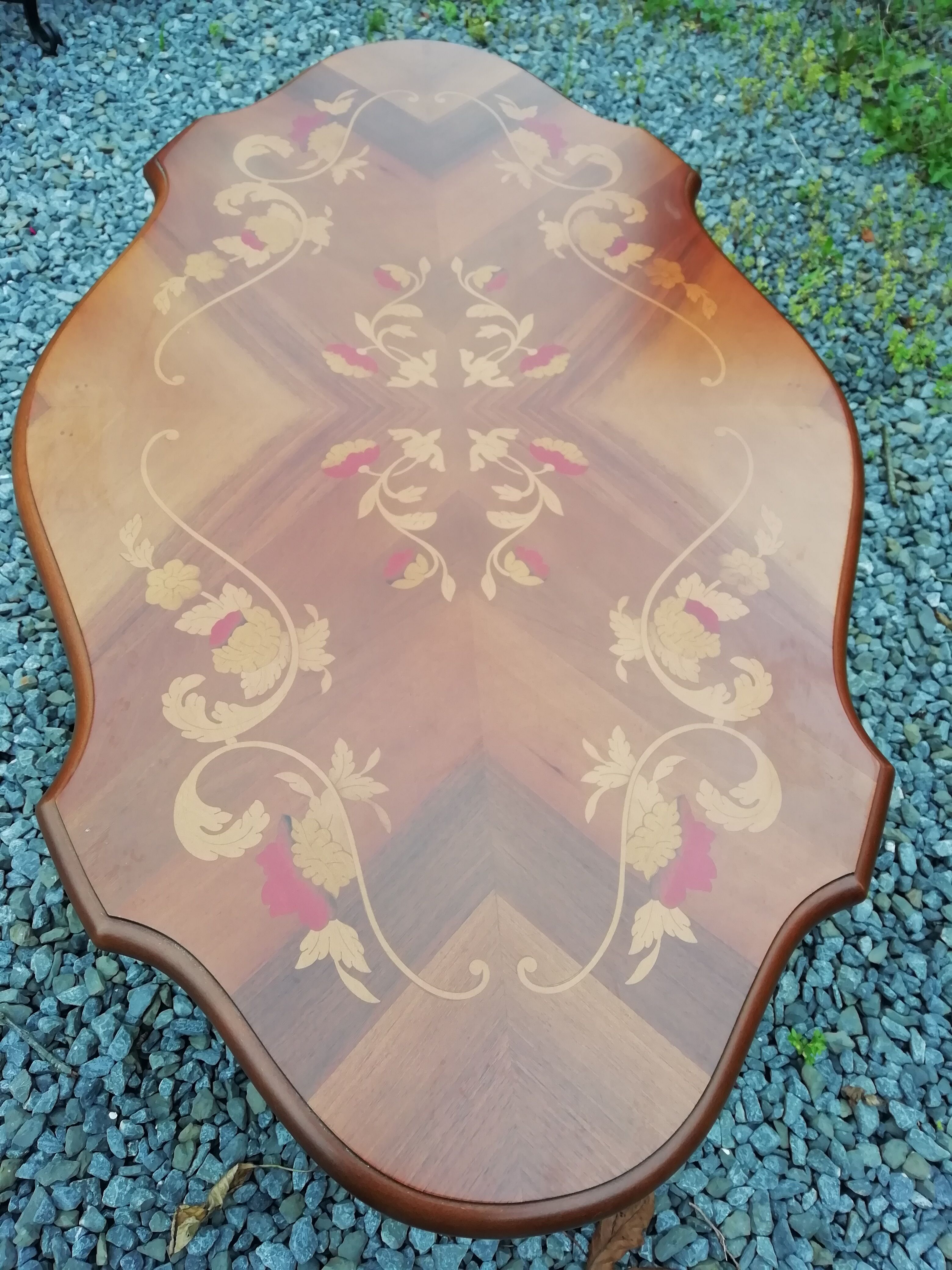 Coffee table with marquetry top