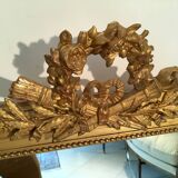 Louis XVI style and 19th century fireplace mirror