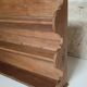 Old wall shelf in raw wood