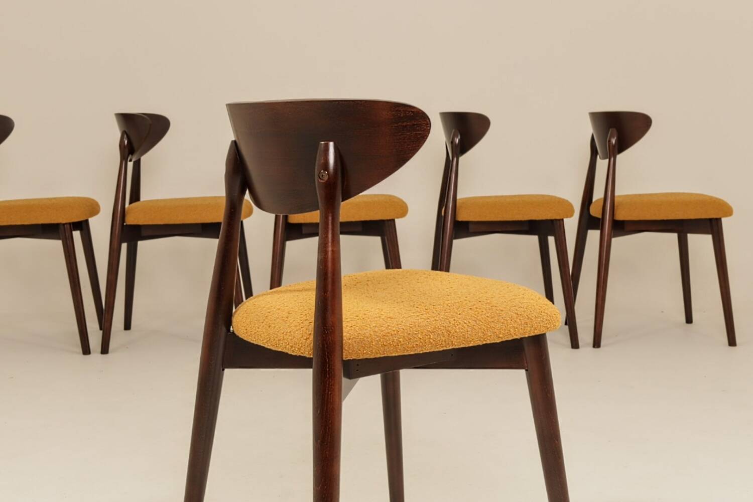 Scandinavian design mustard boucle dining chairs