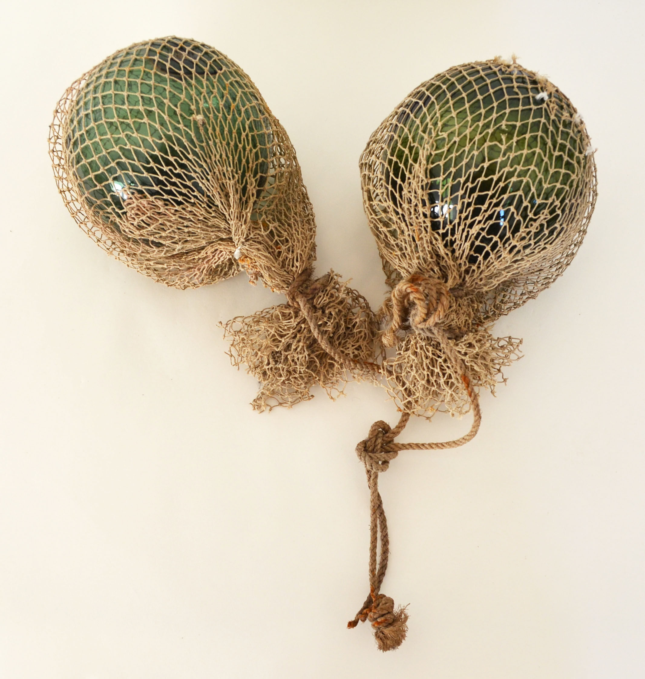 Two old glass floats
