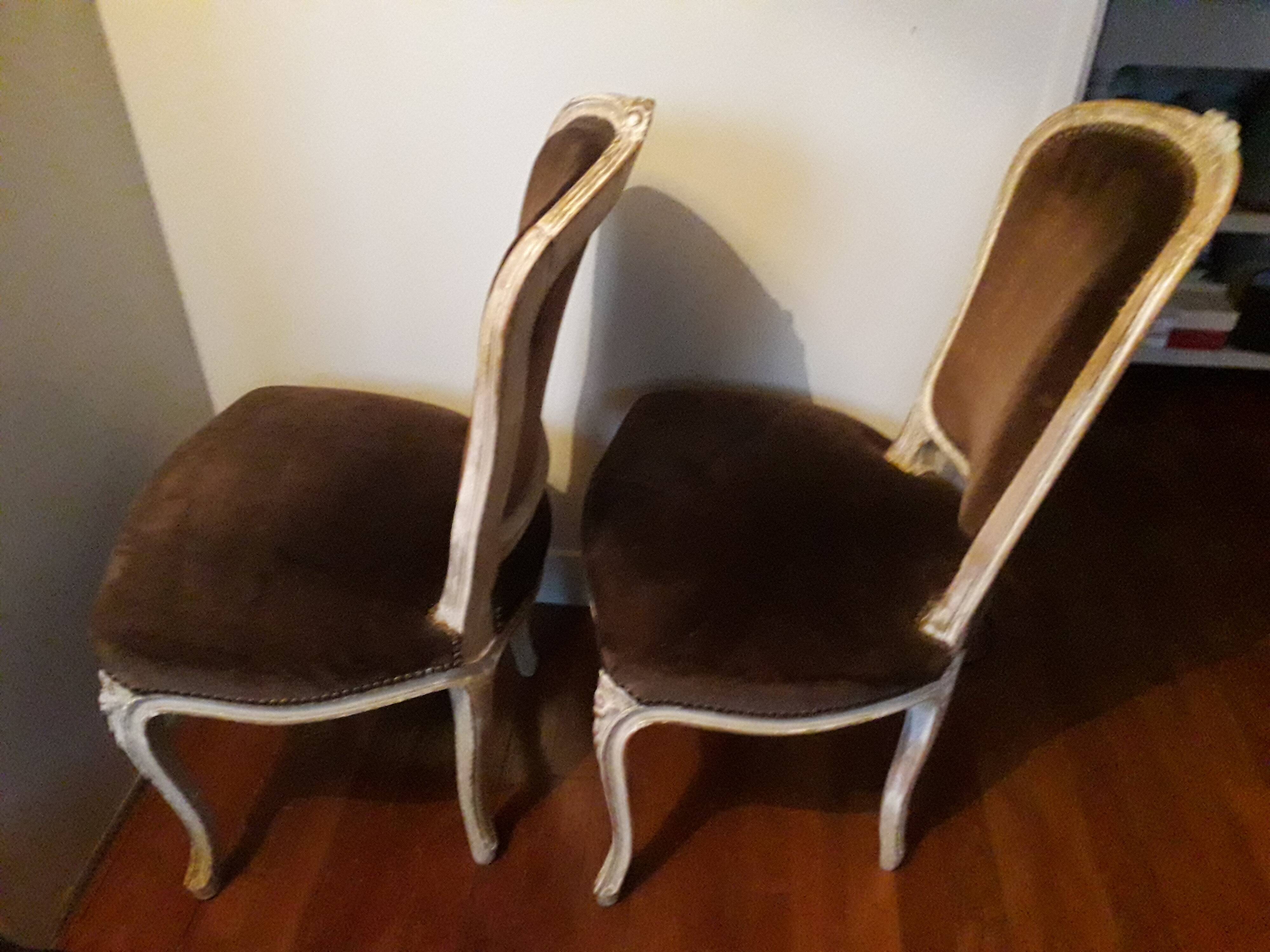 A pair of Louis XV style armchairs in wood and velvet fabrics