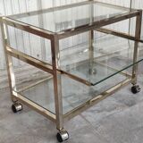 Rolling console service design / gold metal and glass