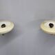 Pair of Czechoslovak Art Deco wall sconces from the 1940s in brass with opaline glass shades.