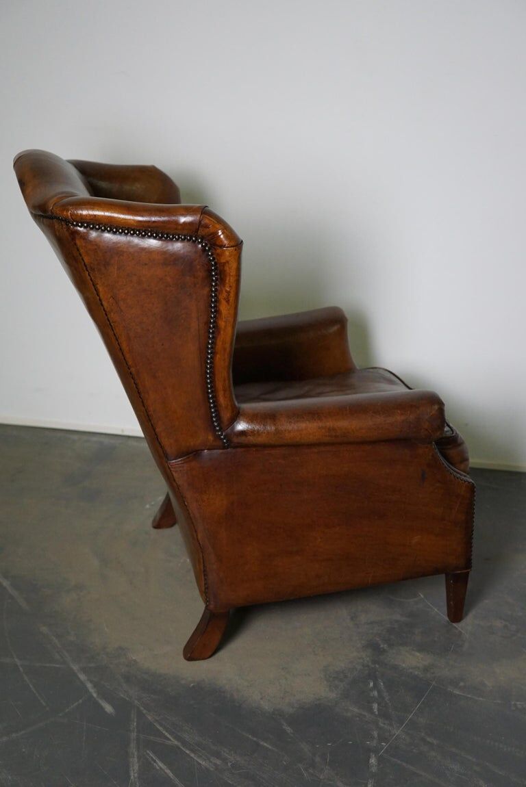 Fauteuil club vintage en cuir de couleur cognac Pays-Bas