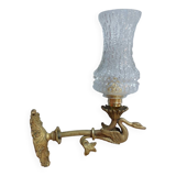 Swan and glass globe wall lamp