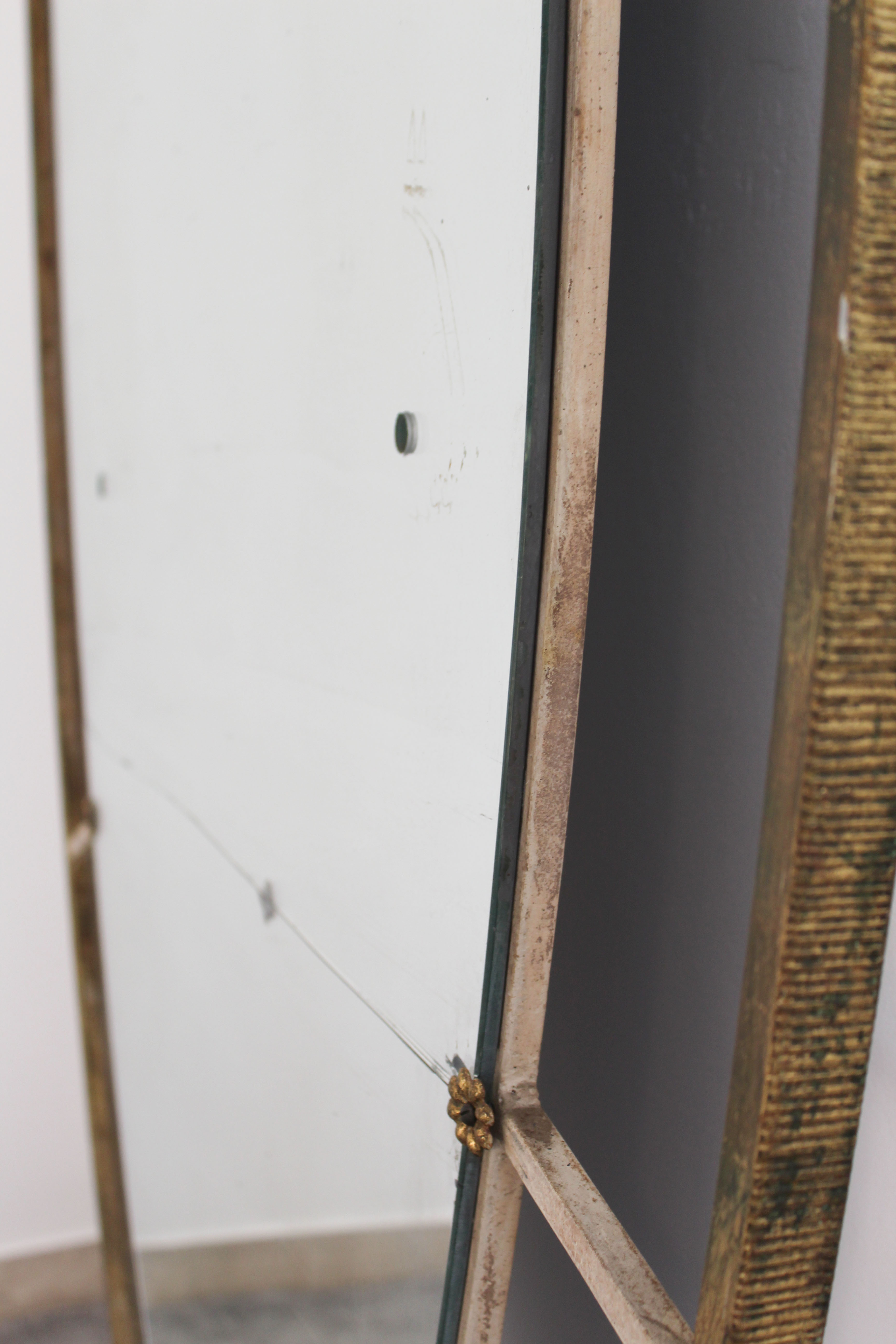 Oval mirror in art deco brass, Italy 1940s.