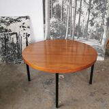 Round coffee table in walnut veneer and metal