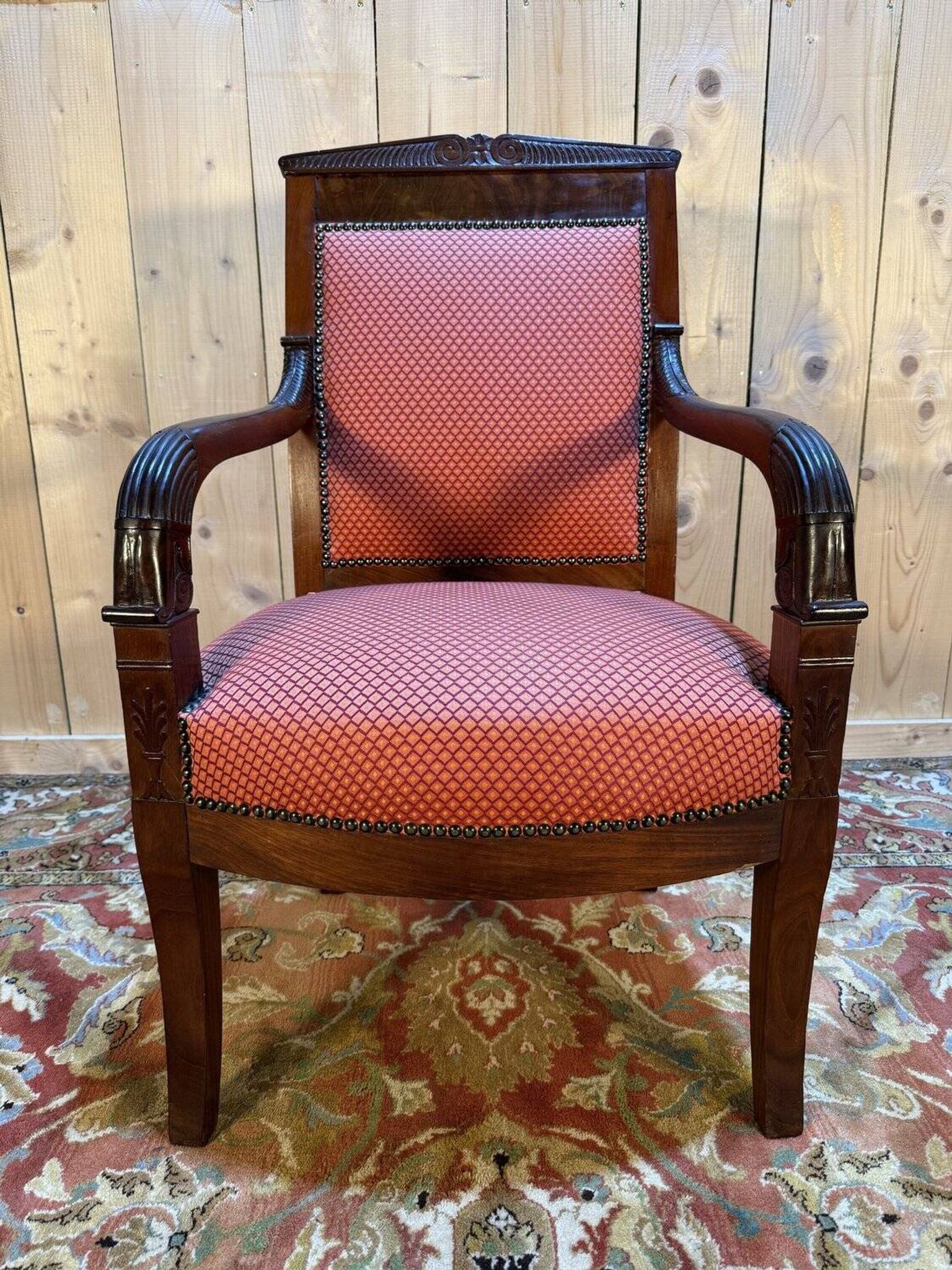 Fauteuil époque Empire en acajou pieds sabres