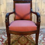 Empire period armchair in mahogany with saber legs.