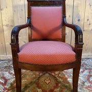 Fauteuil époque Empire en acajou pieds sabres