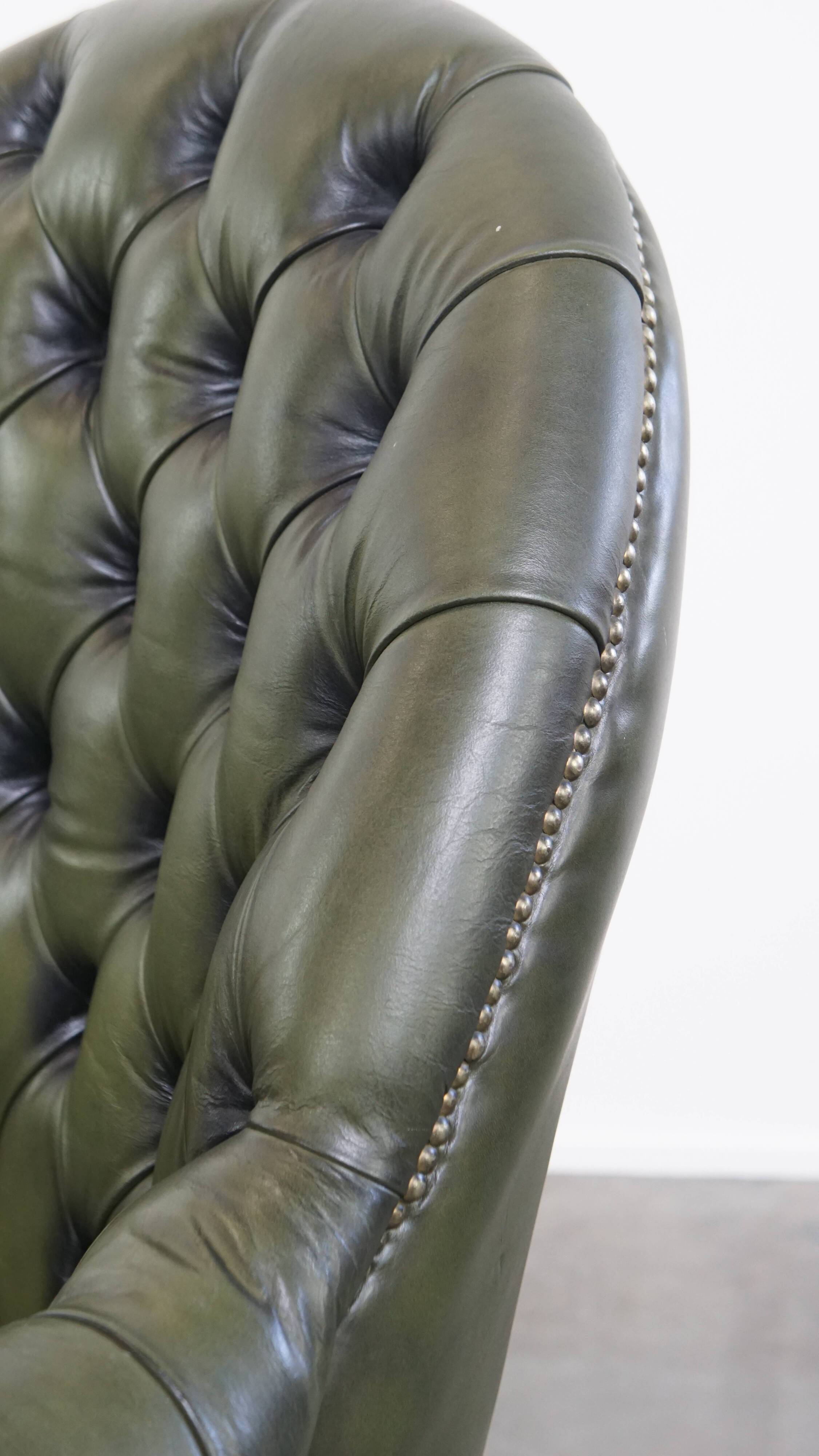 Chesterfield office chair in green cowhide leather on casters with high back