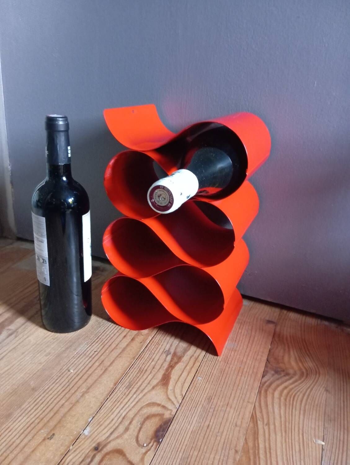 Red painted metal bottle holder, vintage 1980