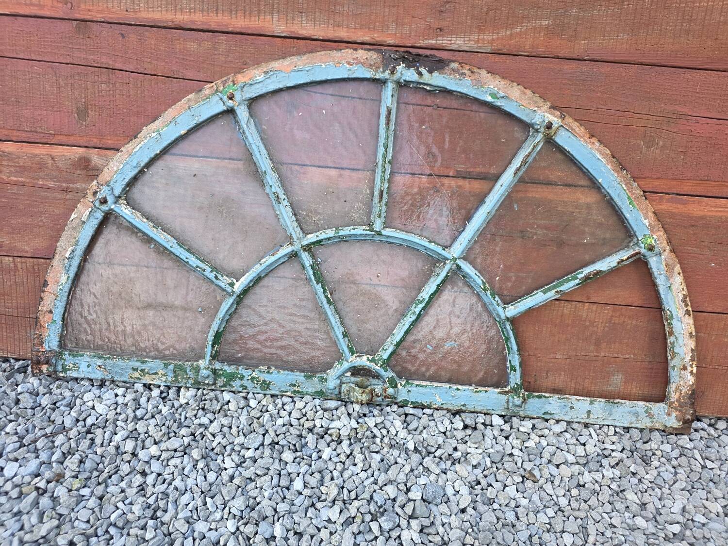 Old wrought iron full riveted gates from the 19th century.