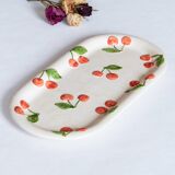 Old cake dish in cherry slip